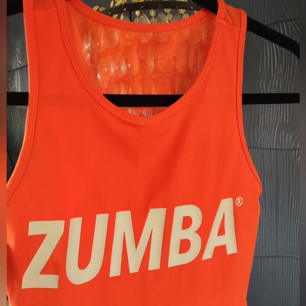Zumba orange with tan crop top and sheer back Size Large fits like Medium